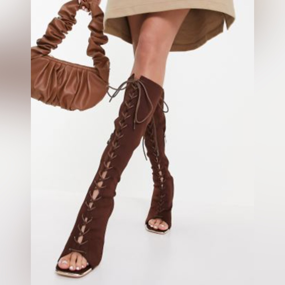 Brown lace up knee high boots
